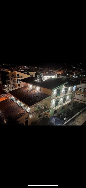 an overhead view of a city at night with lights at B&B Villa Mariotta in Amantea