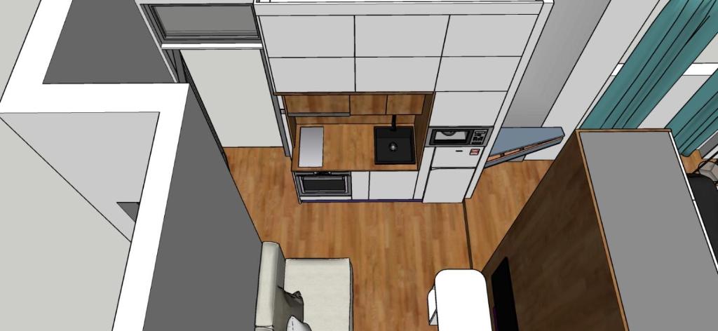 a floor plan of a room with a kitchen at Dhome in Tirana