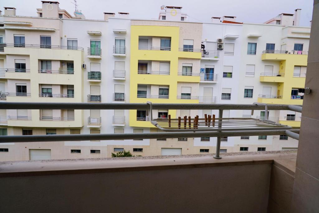 a view of an apartment building from a balcony at Always on the way - Road Home in Montijo, Lisbon in Montijo
