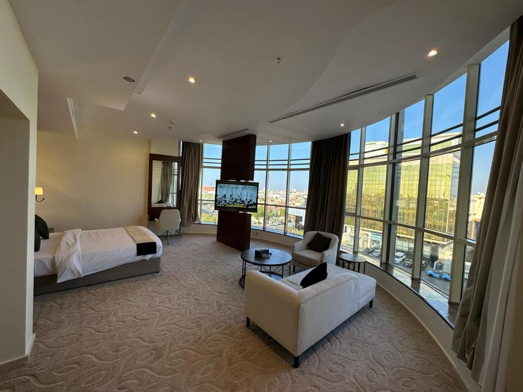 Postel nebo postele na pokoji v ubytování The S Hotel - jeddah - prince sultan street - فندق ذا اس - جده - طريق الامير سلطان
