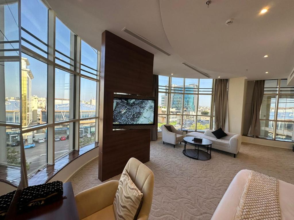 TV a/nebo společenská místnost v ubytování The S Hotel - jeddah - prince sultan street - فندق ذا اس - جده - طريق الامير سلطان