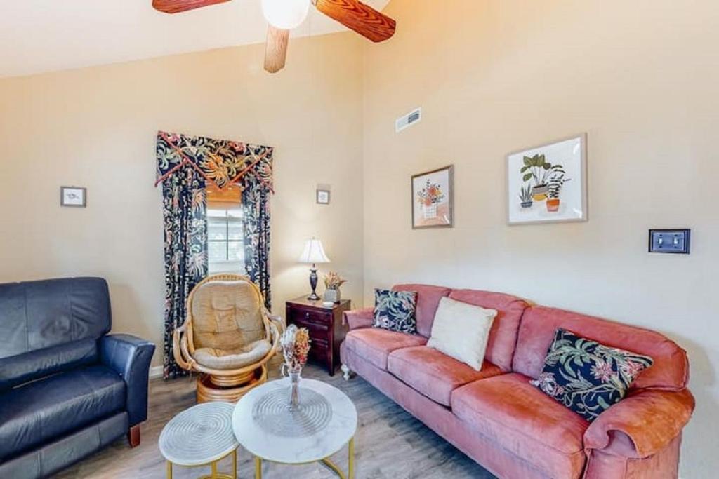 a living room with a couch and a table at Ocean City Townhome by Beach Bayside in Ocean City