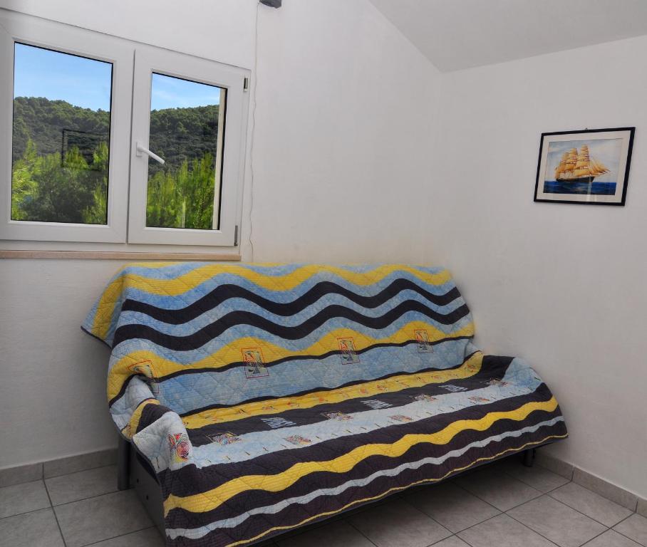 Łóżko lub łóżka w pokoju w obiekcie Apartments Livia