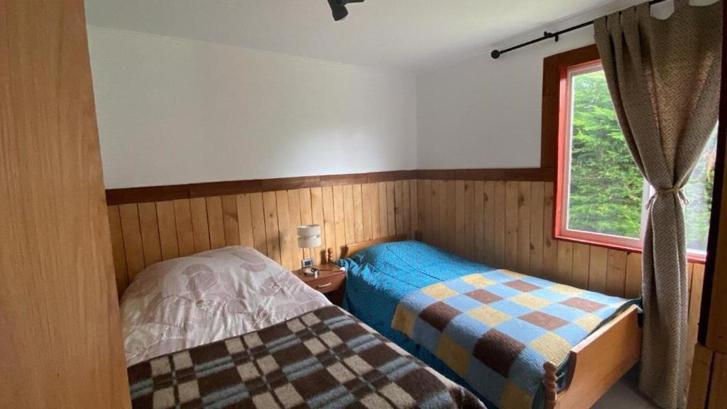 Ένα ή περισσότερα κρεβάτια σε δωμάτιο στο Cabaña el olivo