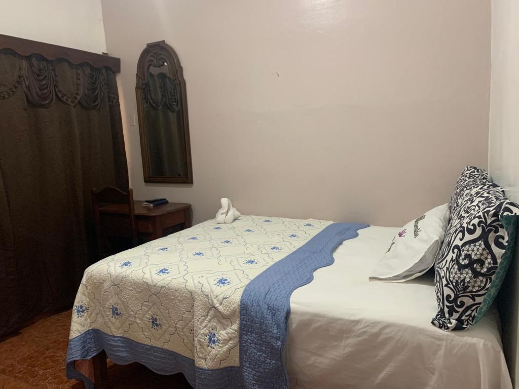 Postel nebo postele na pokoji v ubytování Hotel Marjenny