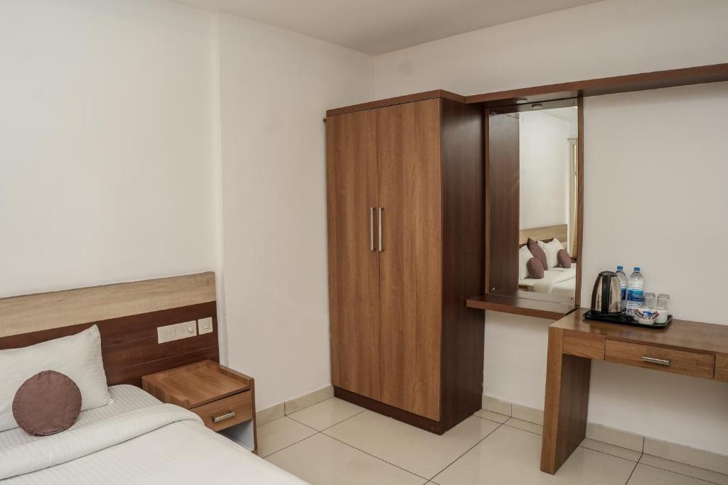 Postel nebo postele na pokoji v ubytování HOTEL LETS STAY