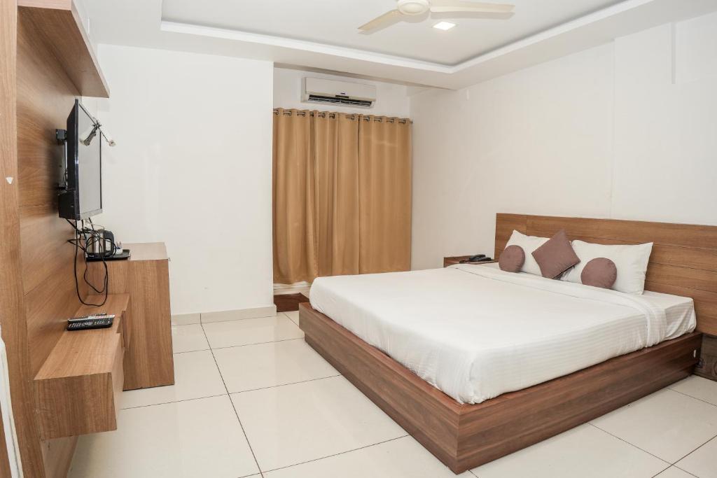 Postel nebo postele na pokoji v ubytování HOTEL LETS STAY