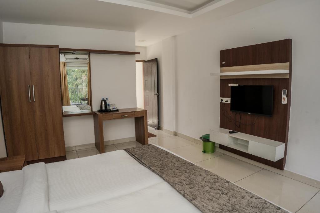 TV a/nebo společenská místnost v ubytování HOTEL LETS STAY