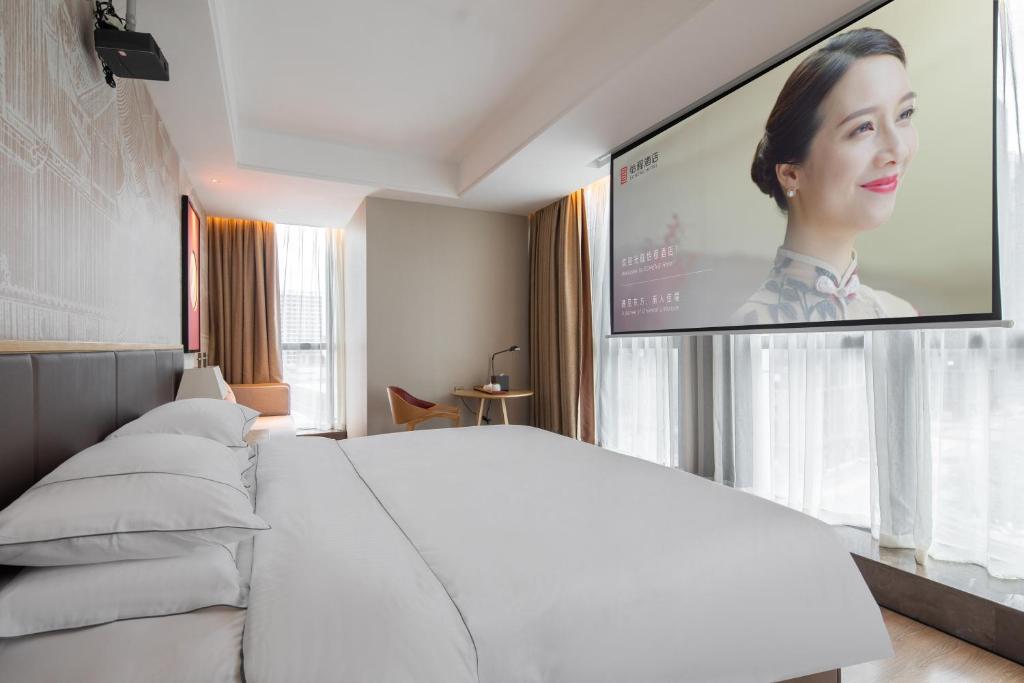 TV a/nebo společenská místnost v ubytování Echeng Hotel - Huawei Base Store in Shenzhen
