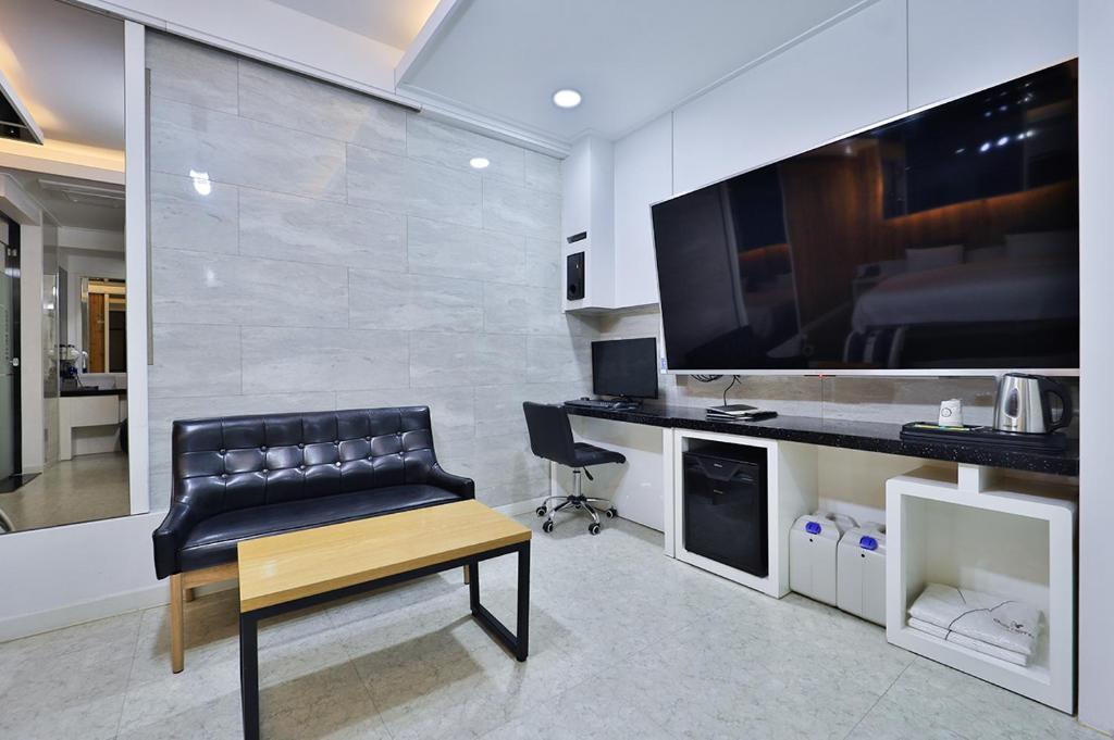 Kuchyň nebo kuchyňský kout v ubytování G&G Hotel