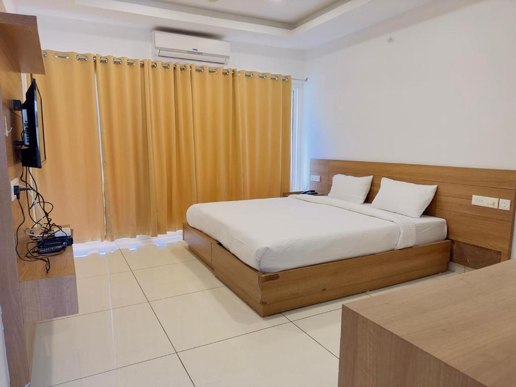 Postel nebo postele na pokoji v ubytování HOTEL LETS STAY