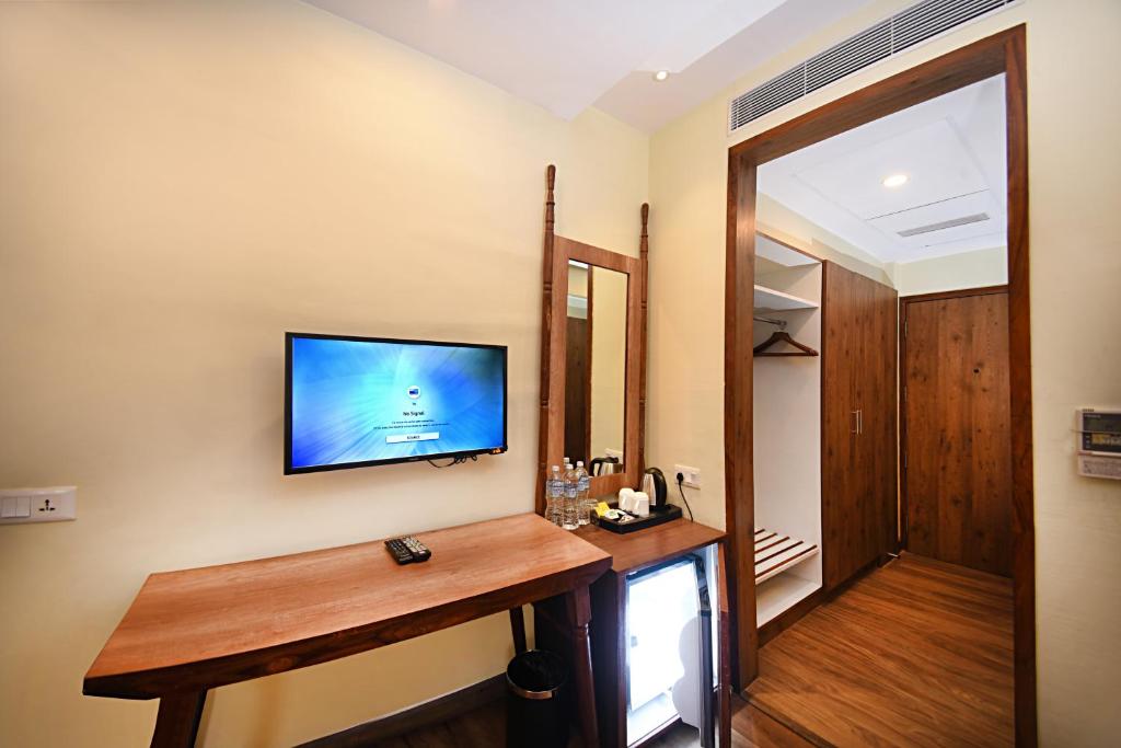 TV a/nebo společenská místnost v ubytování Woodapple Hotel and Spa