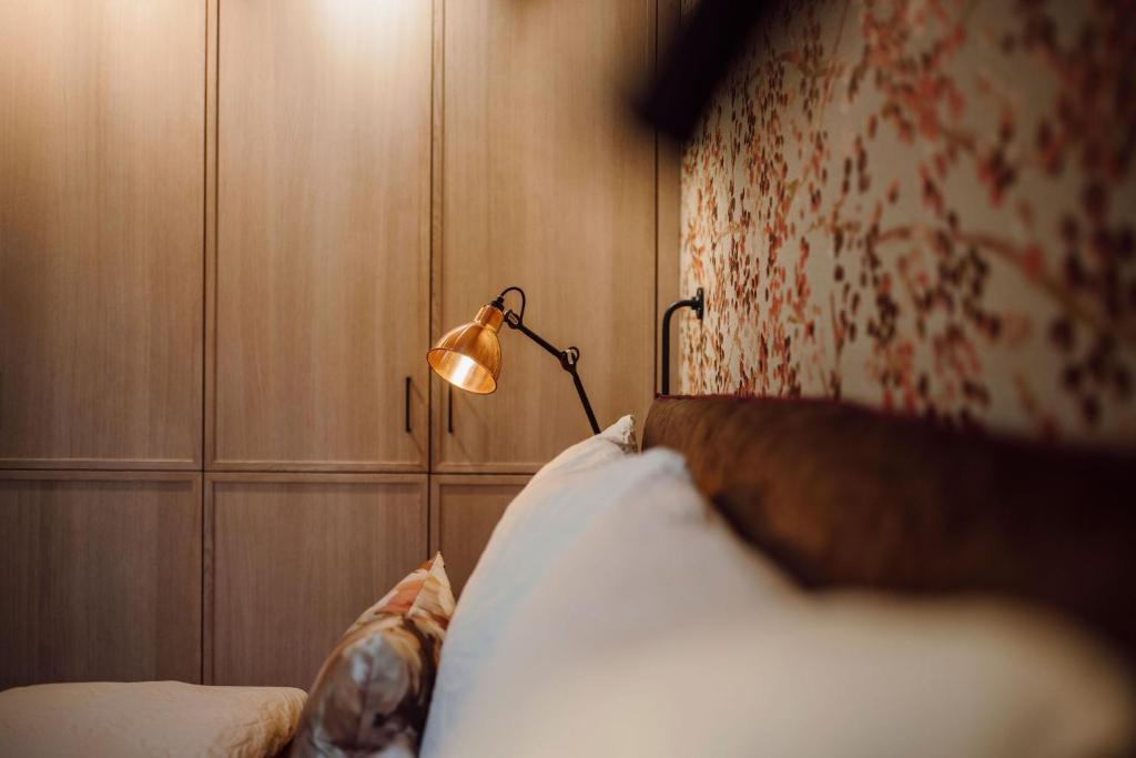 Postel nebo postele na pokoji v ubytování Boutique Hotel Das Rivus