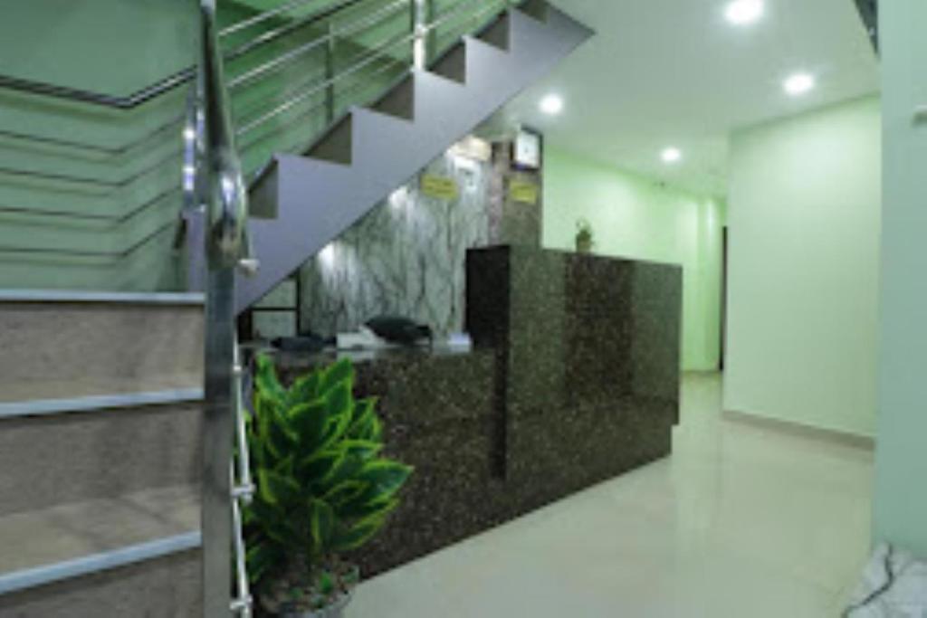 a hallway with a staircase in a building at CITY VIEW, Port Blair in Port Blair