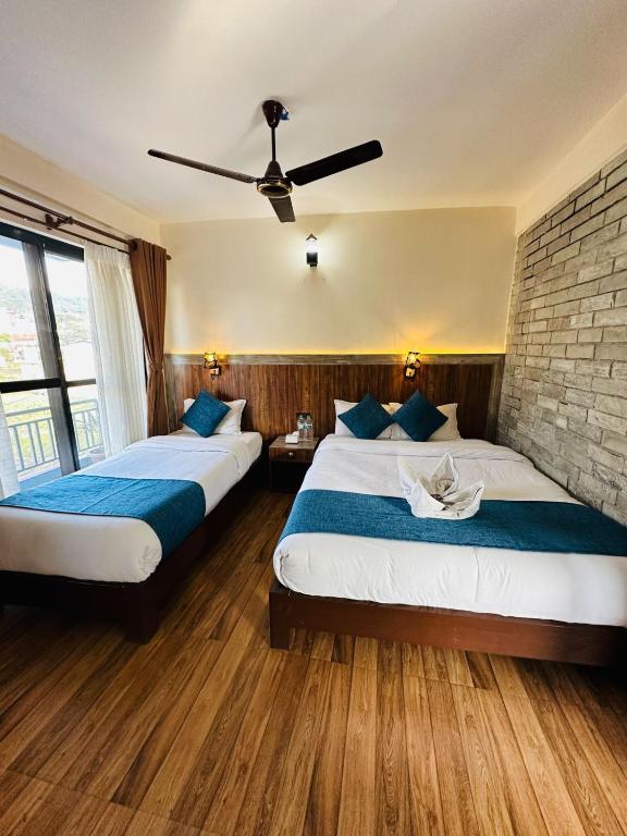 Postel nebo postele na pokoji v ubytování Hotel Mountain Dream