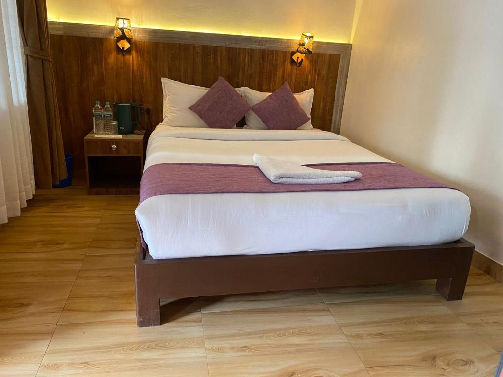 Postel nebo postele na pokoji v ubytování Hotel Mountain Dream