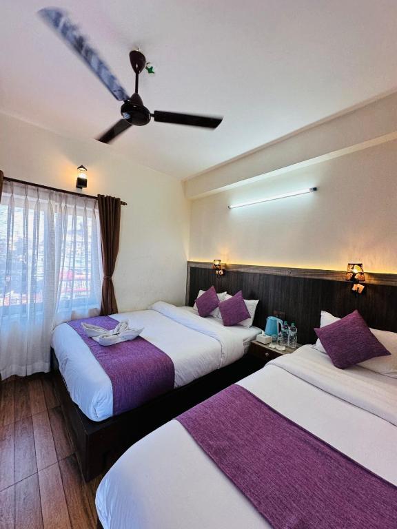Postel nebo postele na pokoji v ubytování Hotel Mountain Dream