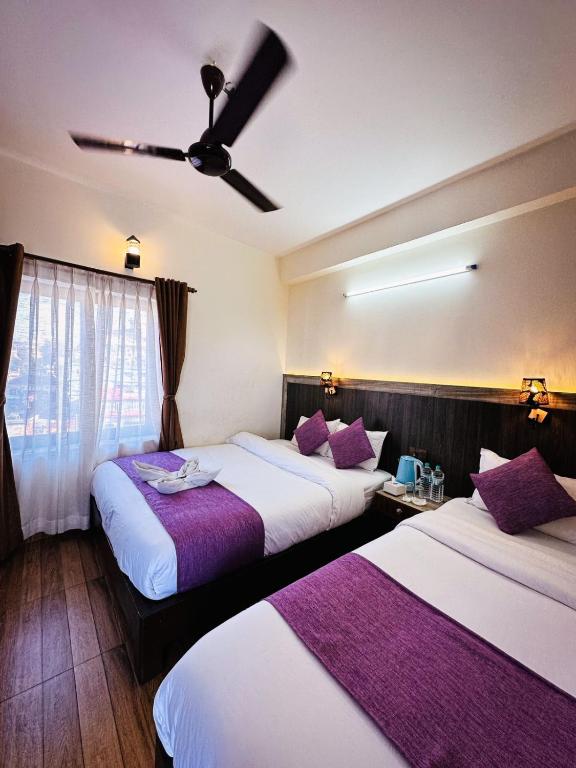 Postel nebo postele na pokoji v ubytování Hotel Mountain Dream