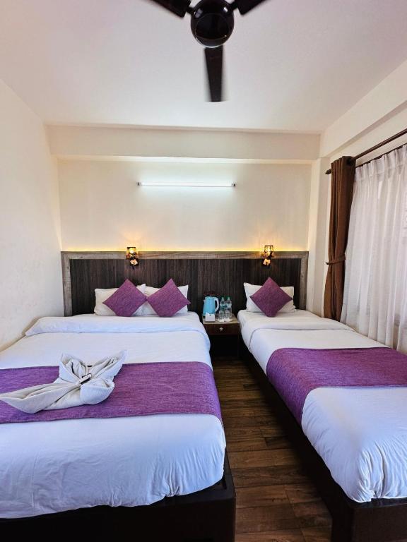 Postel nebo postele na pokoji v ubytování Hotel Mountain Dream