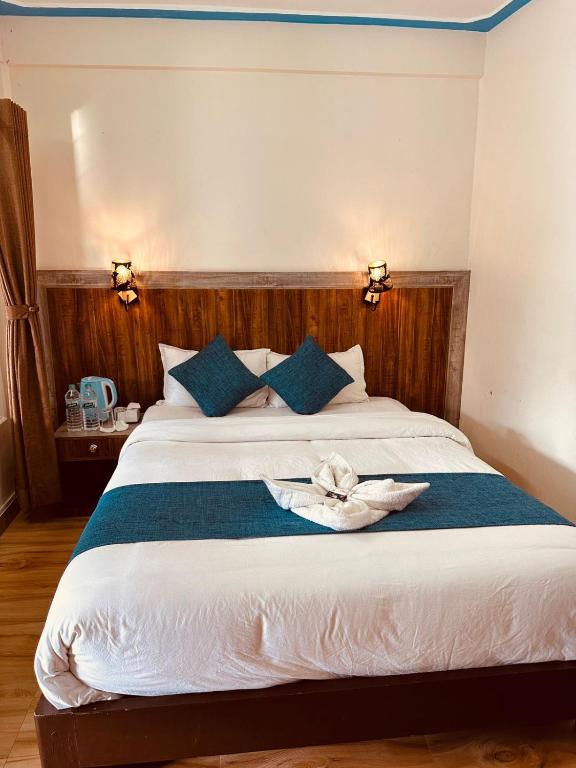 Postel nebo postele na pokoji v ubytování Hotel Mountain Dream