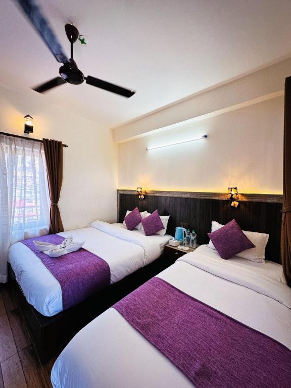 Postel nebo postele na pokoji v ubytování Hotel Mountain Dream