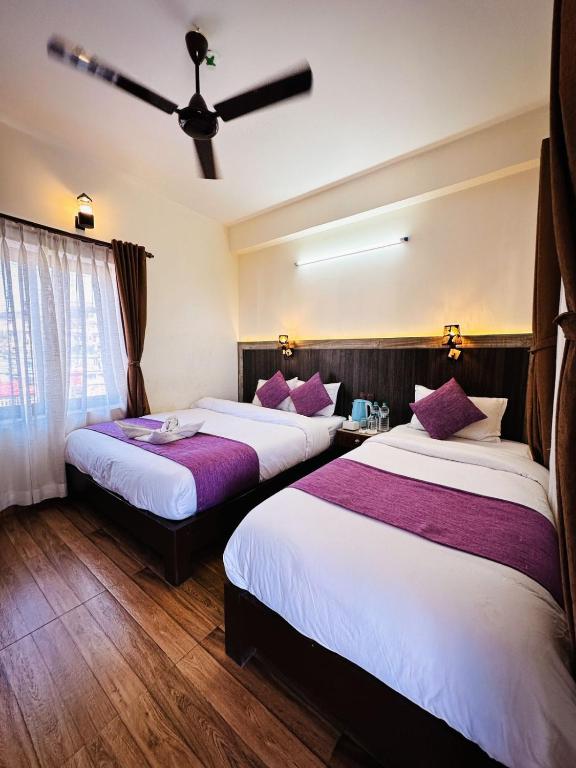 Postel nebo postele na pokoji v ubytování Hotel Mountain Dream