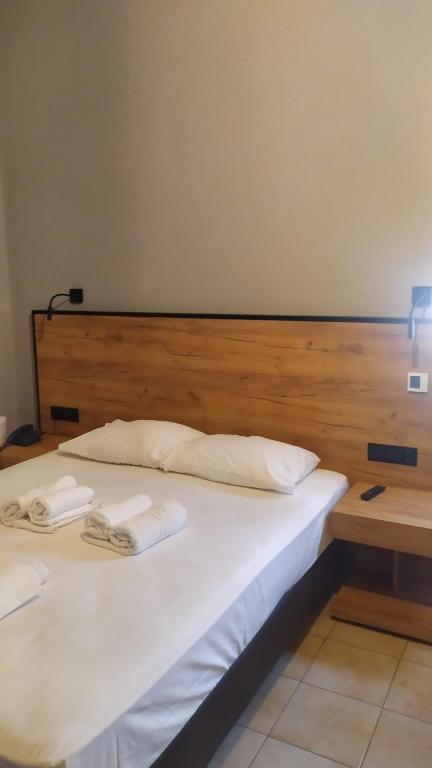 Postel nebo postele na pokoji v ubytování Hotel Plaza