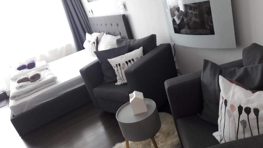 Posezení v ubytování Top Appartment mit Weitblick und Late Check-Out inklusive aktivCARD
