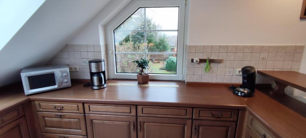 Kuchyň nebo kuchyňský kout v ubytování Ferienwohnung Rhöner WeitBlick