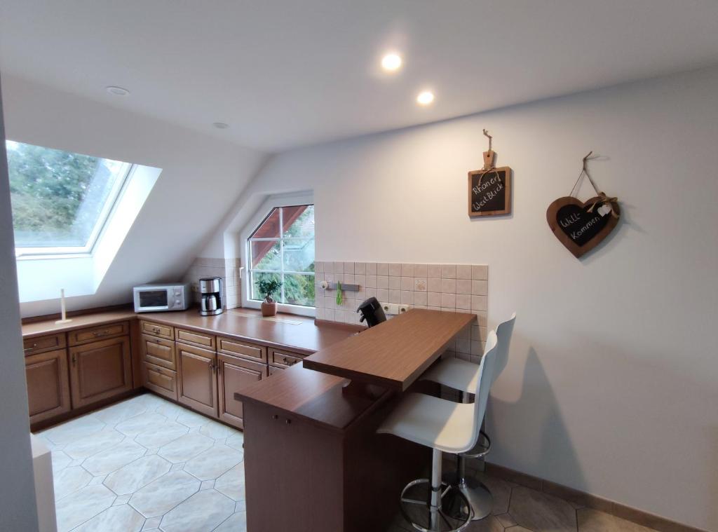 Kuchyň nebo kuchyňský kout v ubytování Ferienwohnung Rhöner WeitBlick