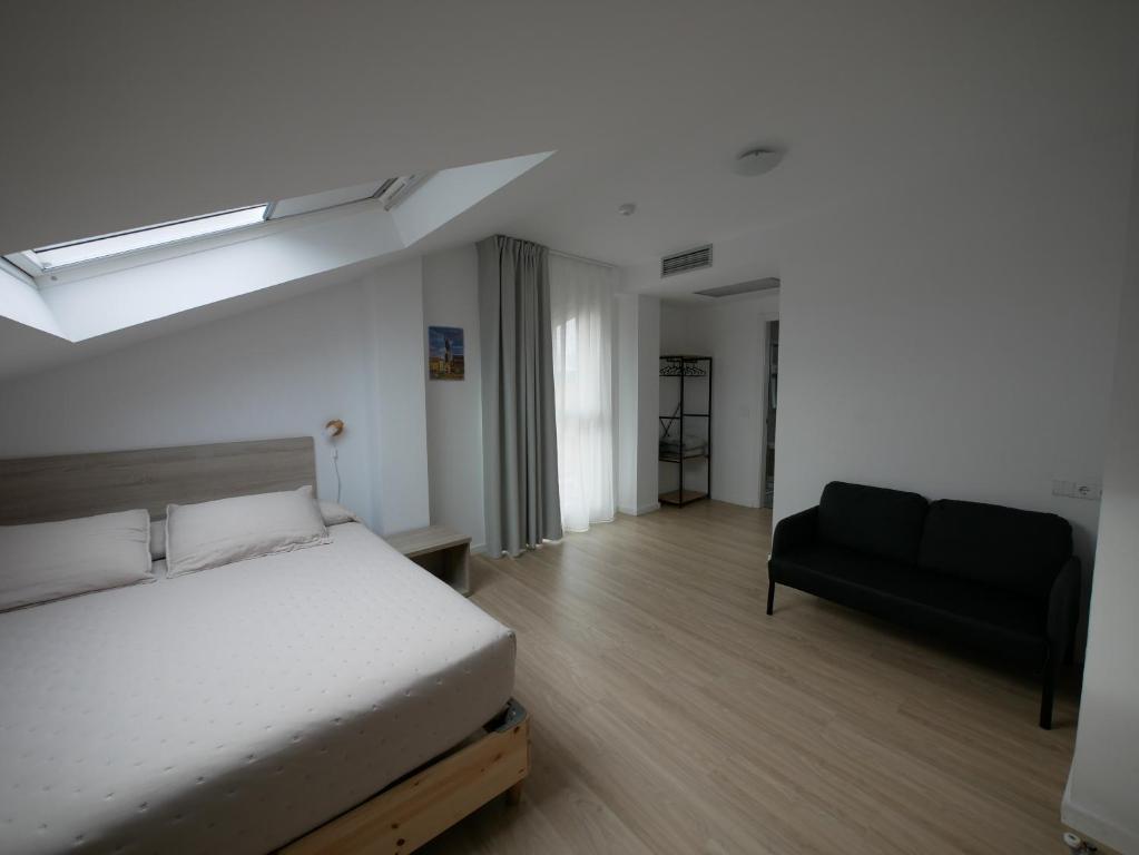 Postel nebo postele na pokoji v ubytování Hotel Myro