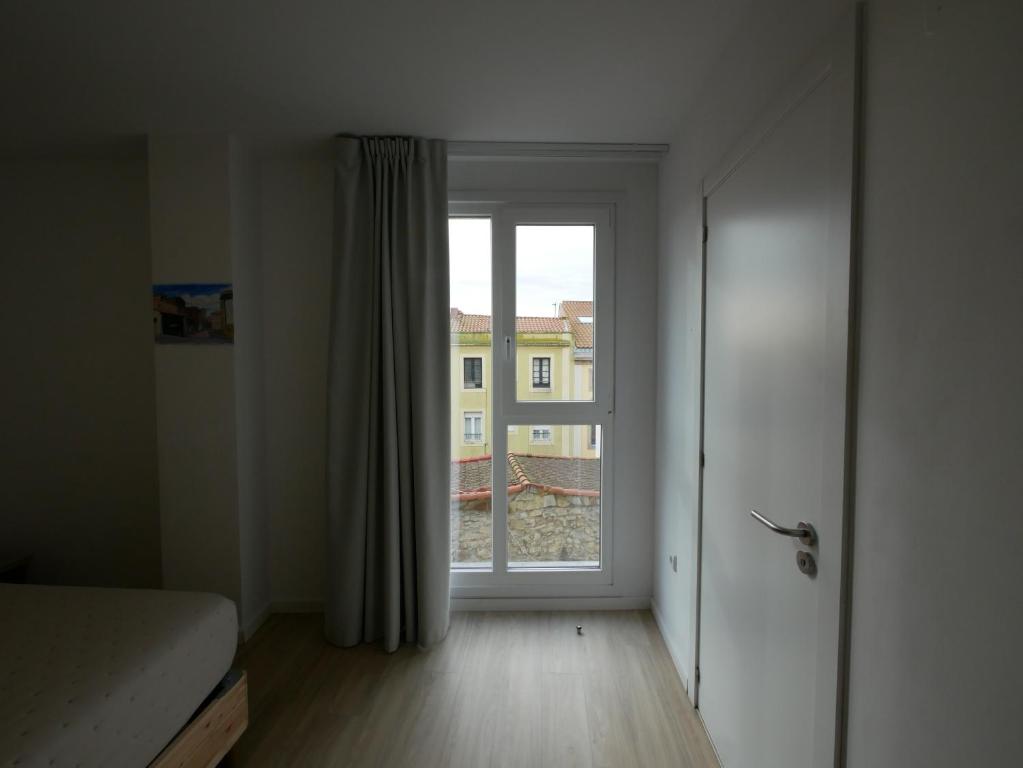Postel nebo postele na pokoji v ubytování Hotel Myro