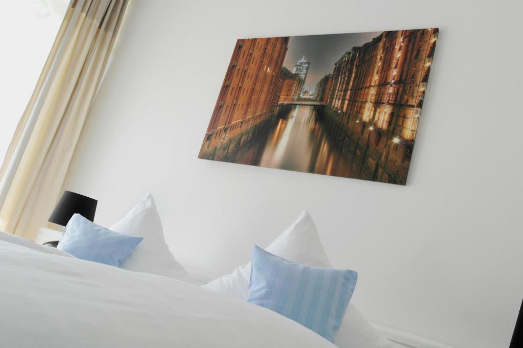 Postel nebo postele na pokoji v ubytování Hotel Blauer Fasan