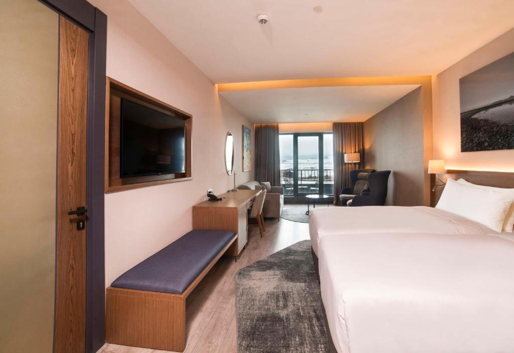 Кровать или кровати в номере Radisson Blu Hotel, Mount Erciyes