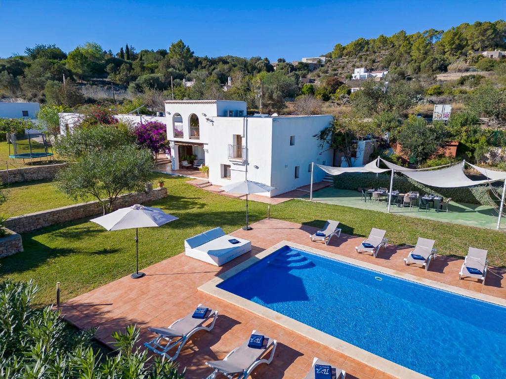 an image of a villa with a swimming pool at Villa in San Jose sleeps 10 - Sa Vinya in Sant Josep de Sa Talaia