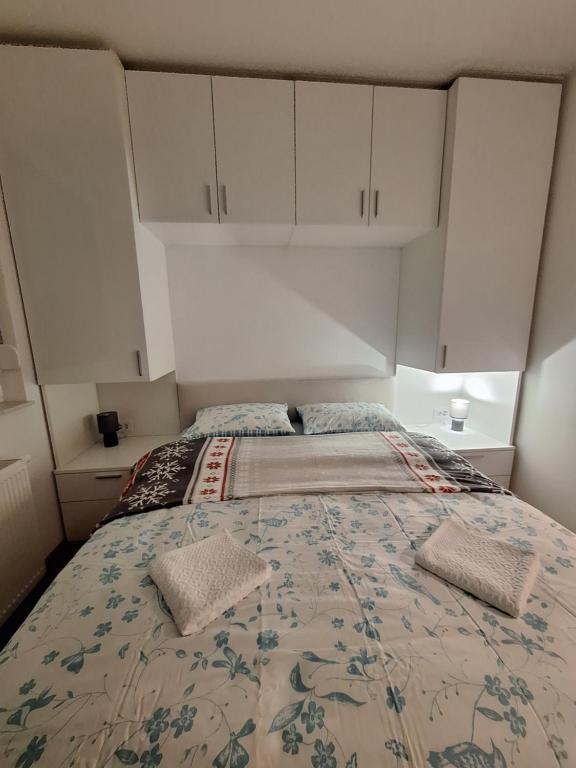 Ένα ή περισσότερα κρεβάτια σε δωμάτιο στο Apartman Oaza