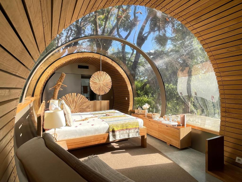 Postel nebo postele na pokoji v ubytování Bubble Lodge Bois Chéri Plantation
