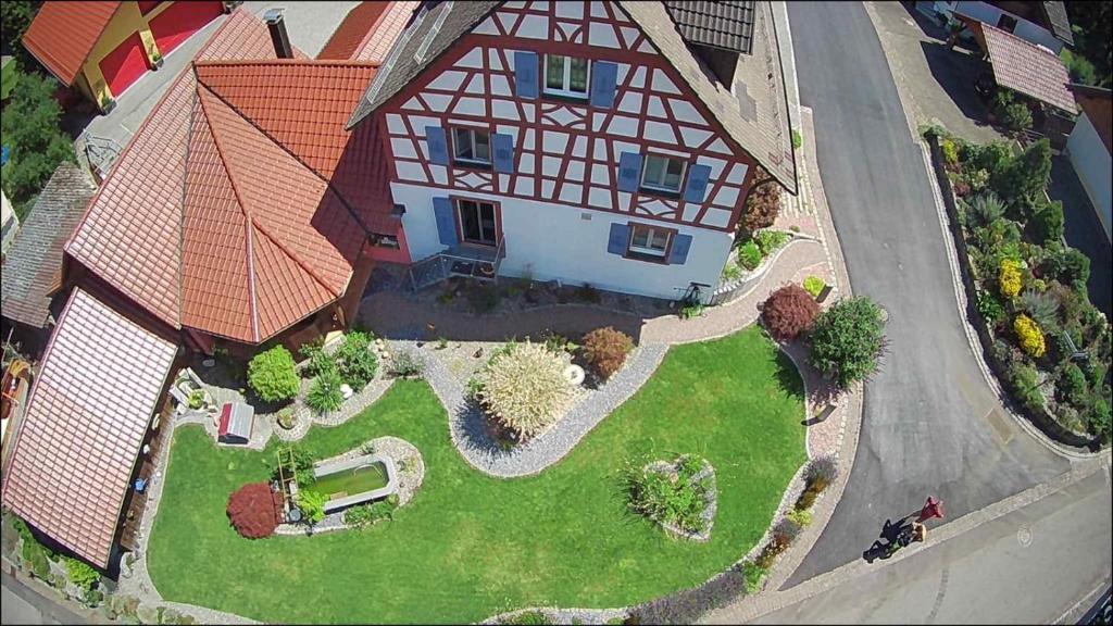 an overhead view of a large house with a yard at Weitblick in Öhningen
