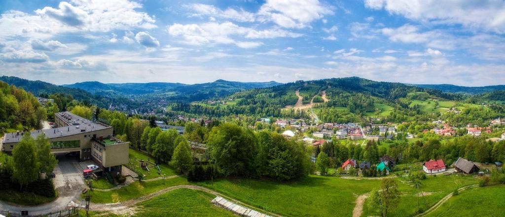 an aerial view of a town in the mountains at Krokus in Wisła