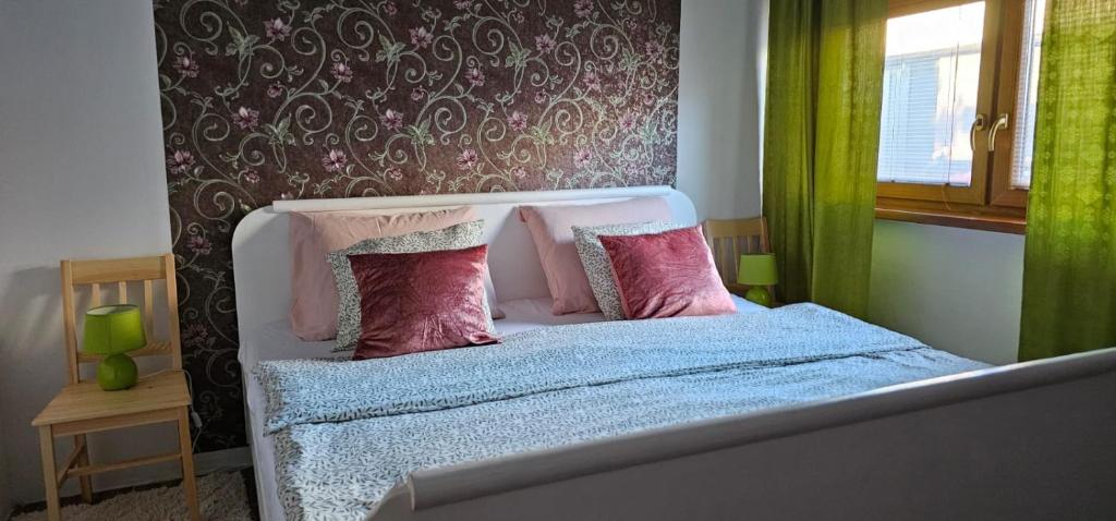 Postel nebo postele na pokoji v ubytování AG Apartment Gabčíkovo