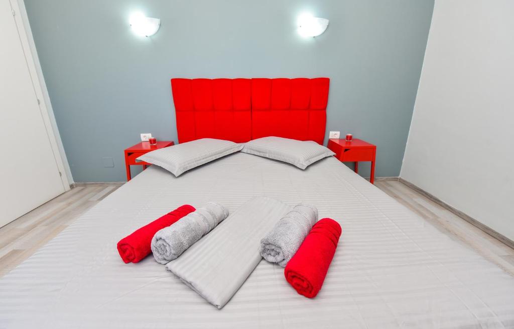 Postel nebo postele na pokoji v ubytování Harmony Residence
