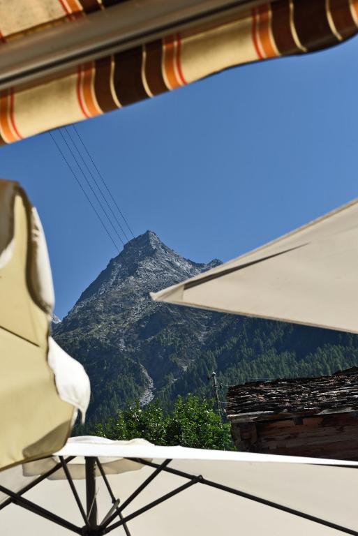 a view of the remarkables mountain from a room at Hotel Les Mélèzes in Haudères