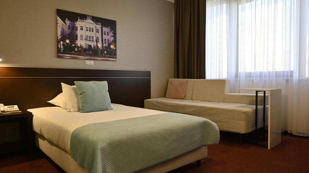 Posteľ alebo postele v izbe v ubytovaní Vestil Hotel