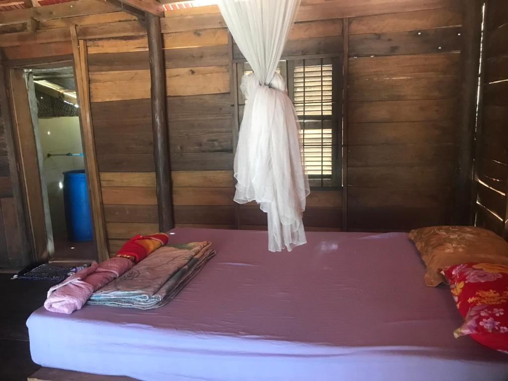 Postel nebo postele na pokoji v ubytování Naks Shack