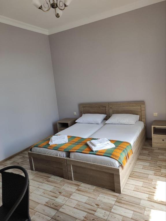 Postel nebo postele na pokoji v ubytování FRESH Hotel Kobuleti