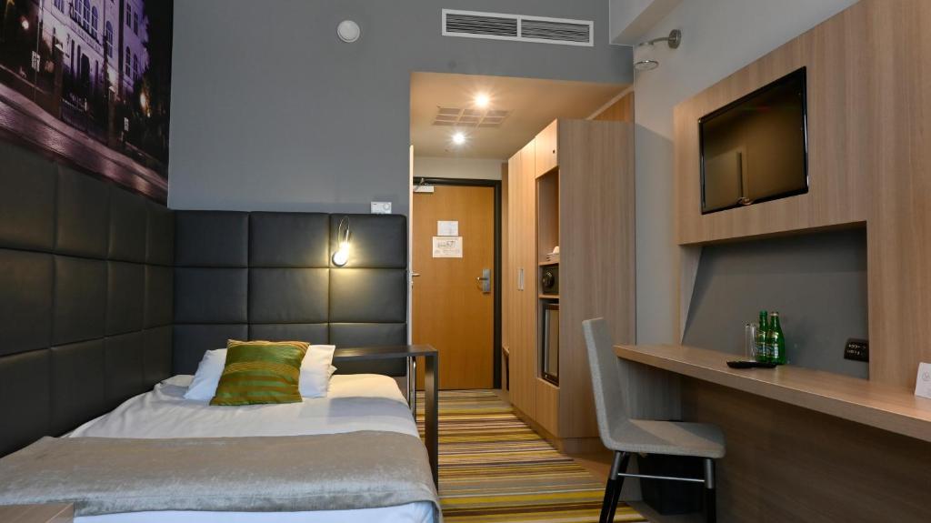 Posteľ alebo postele v izbe v ubytovaní Vestil Hotel