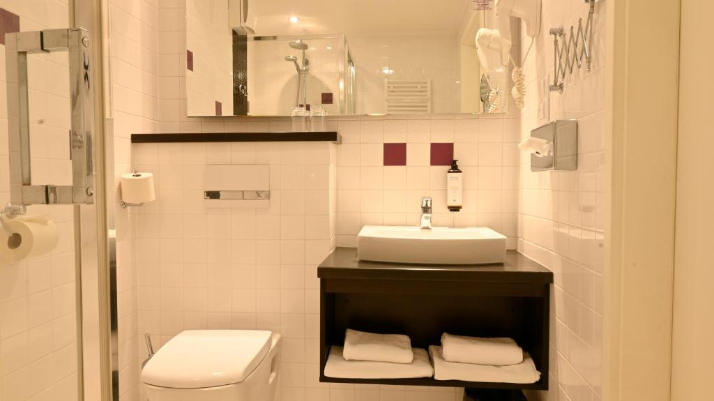 Kúpeľňa v ubytovaní Vestil Hotel