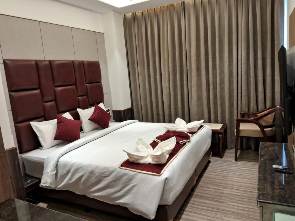 Postel nebo postele na pokoji v ubytování Hotel k11
