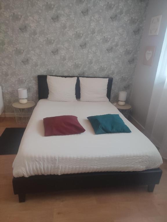 Posteľ alebo postele v izbe v ubytovaní Le Cosy