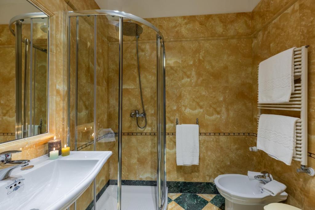 a bathroom with a sink and a shower at Ca' Del Nobile in Venice